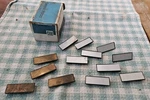 Lot Of 13 Nos 1977-1987 Gm Pull Strap Escutcheon Trim Covers Woodgrain Aluminum. Fixed Price $79.00.